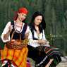 Young girls gather herbs