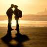 Boy and girl on the beach of the Atlantic