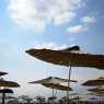Umbrellas on the beach of Hotel Dolphin Marina