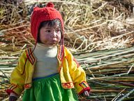 Little kids from reed islands of Uros