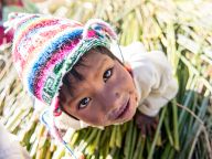 Little kids from reed islands of Uros