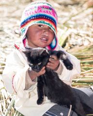 Little kids from reed islands of Uros