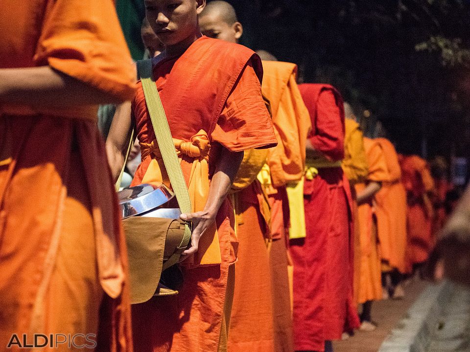 Monks collect alms