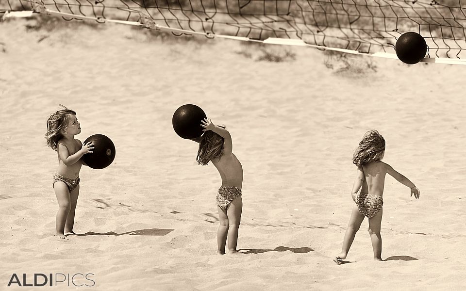 On the beach with ball