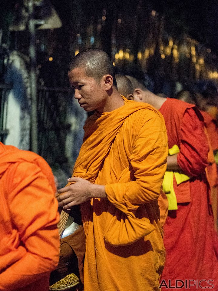 Monks collect alms