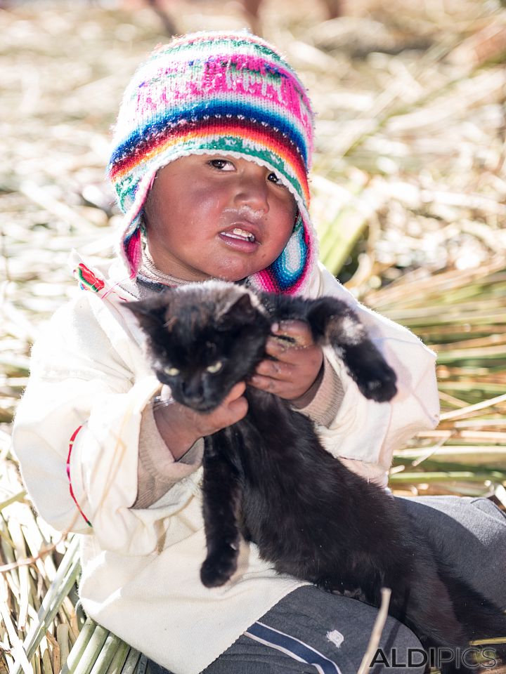 Little kids from reed islands of Uros